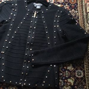 Body hugging, bandage-style cardigan.